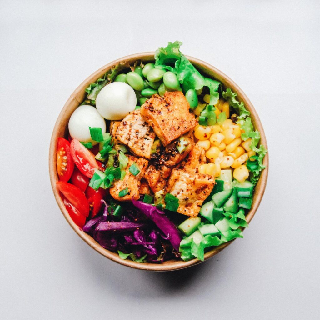 bowl with salad and fresh food