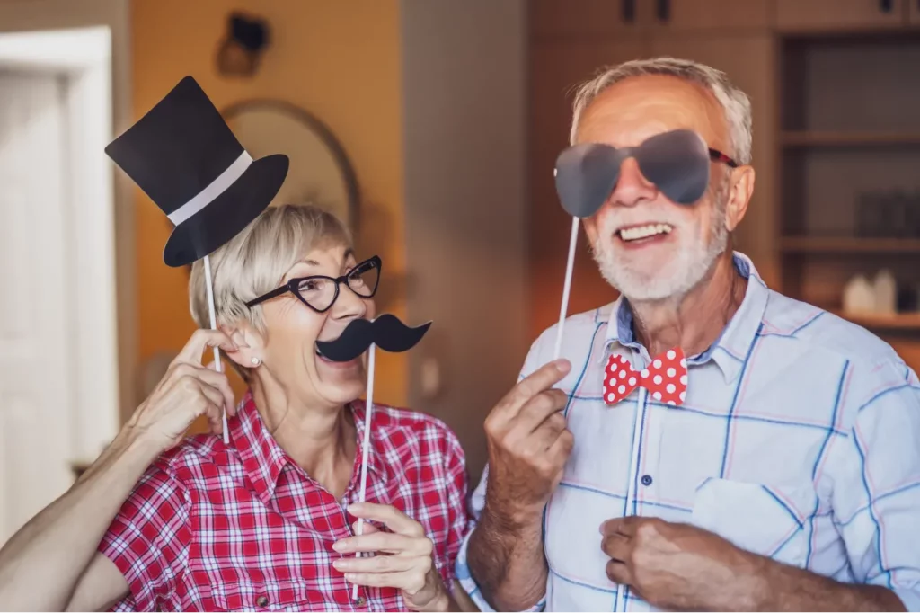 senior couple dressing up for photo